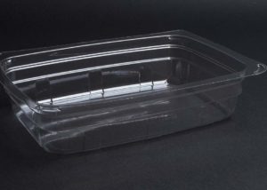 A clear plastic container on a black background.